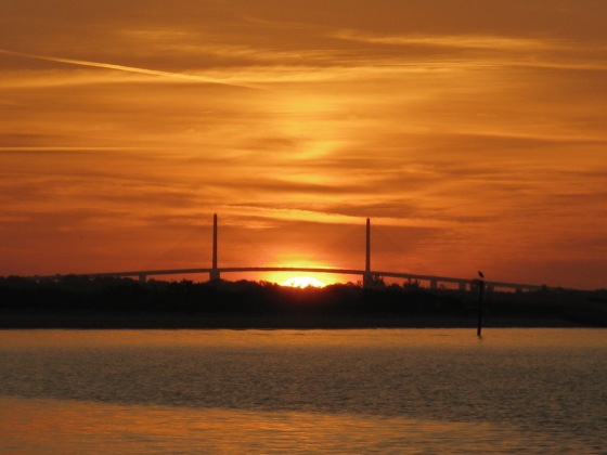 Sunrise behind the Sunshine Skyway Bridge, which spans the mouth of Tampa Bay