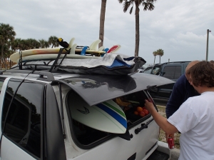 Stacked and packed, a wave-hunting carpool